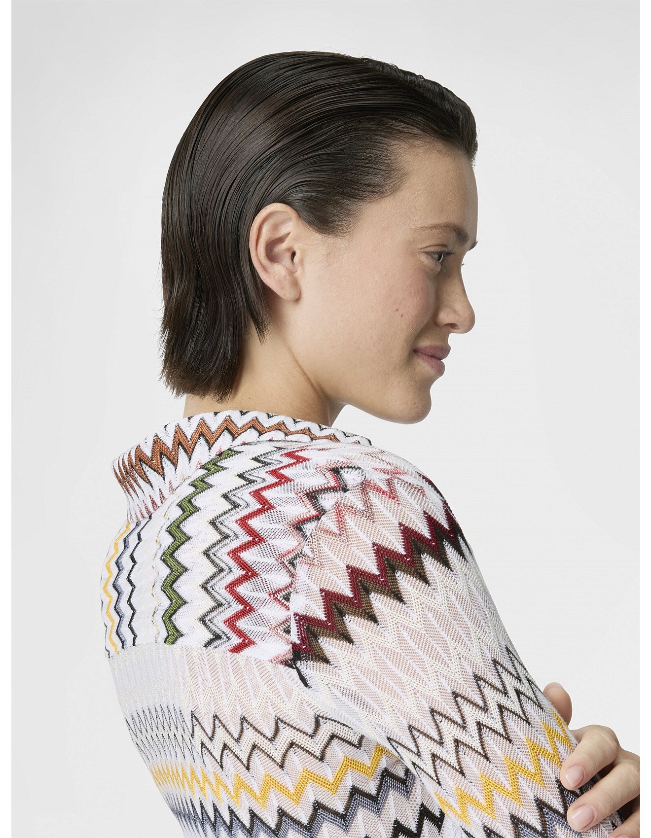 Missoni women's V-neck blouse in cotton and viscose blend. Raschel knit with signature micro zigzag lace motif. 